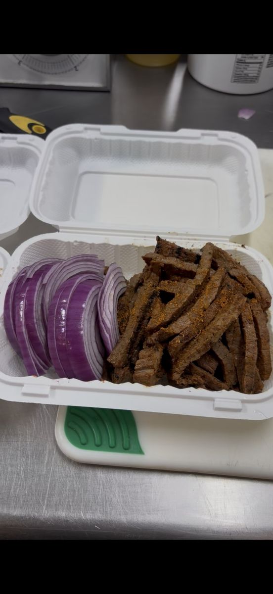 Chopped suya with onions