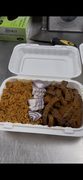 Suya served with smoky Nigerian jollof rice
